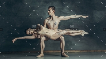 demo-attachment-84-the-young-modern-ballet-dancers-posing-on-gray-JYBC7XQ